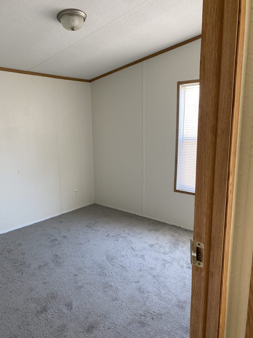 Front Bedroom With Grey Color Carpet Flooring